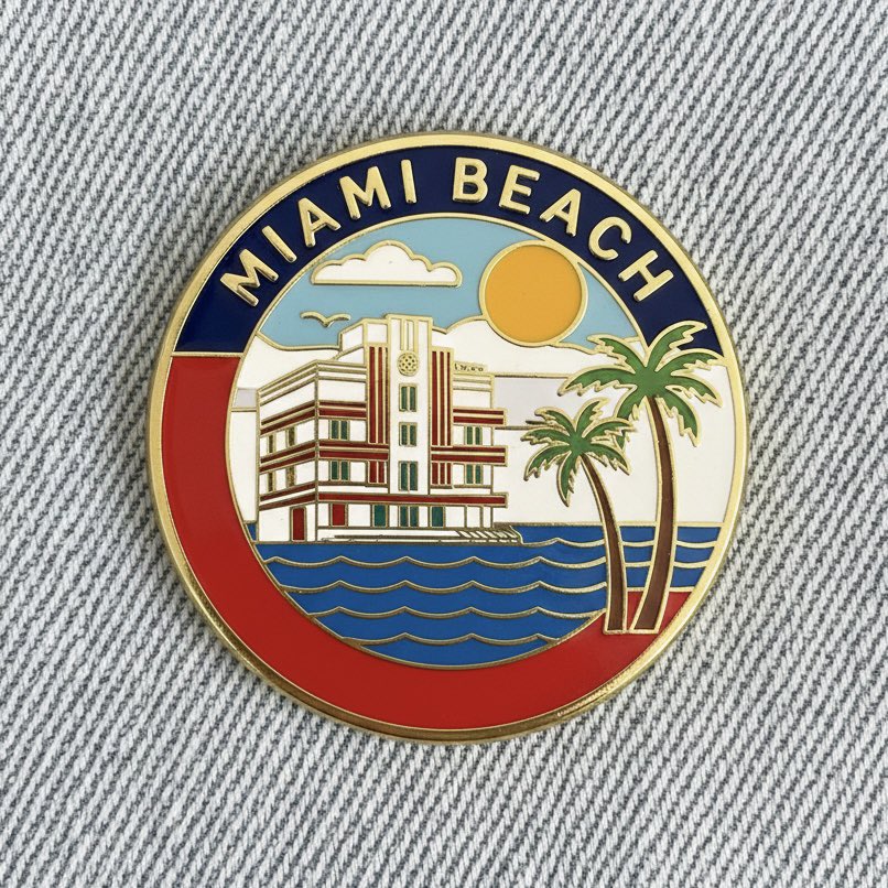 Close up photo of a collectible enamel pin of [CITY], gold pl... 4